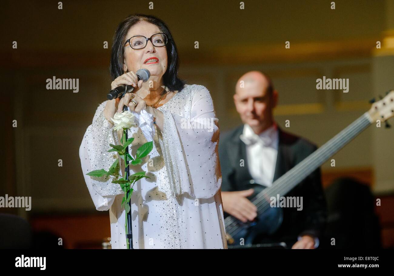 Hamburg, Germany. 13th Oct, 2014. Greek singer Nana Mouskouri sings on her 80th Birthday at the Laeiszhalle in Hamburg, Germany, 13 October 2014. Photo: Markus Scholz/dpa/Alamy Live News Stock Photo