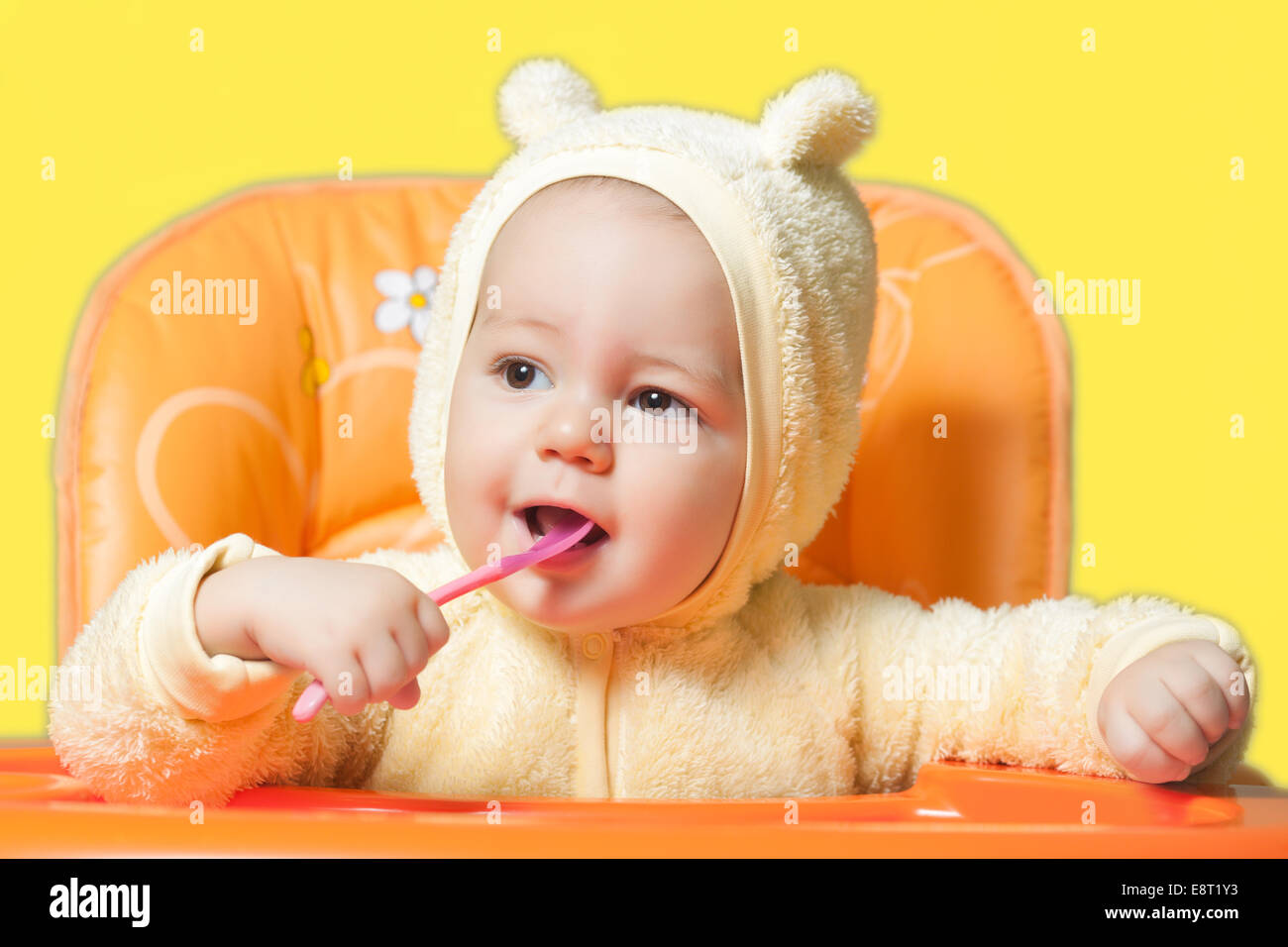 Baby boy eating oatmeal Stock Photo Alamy