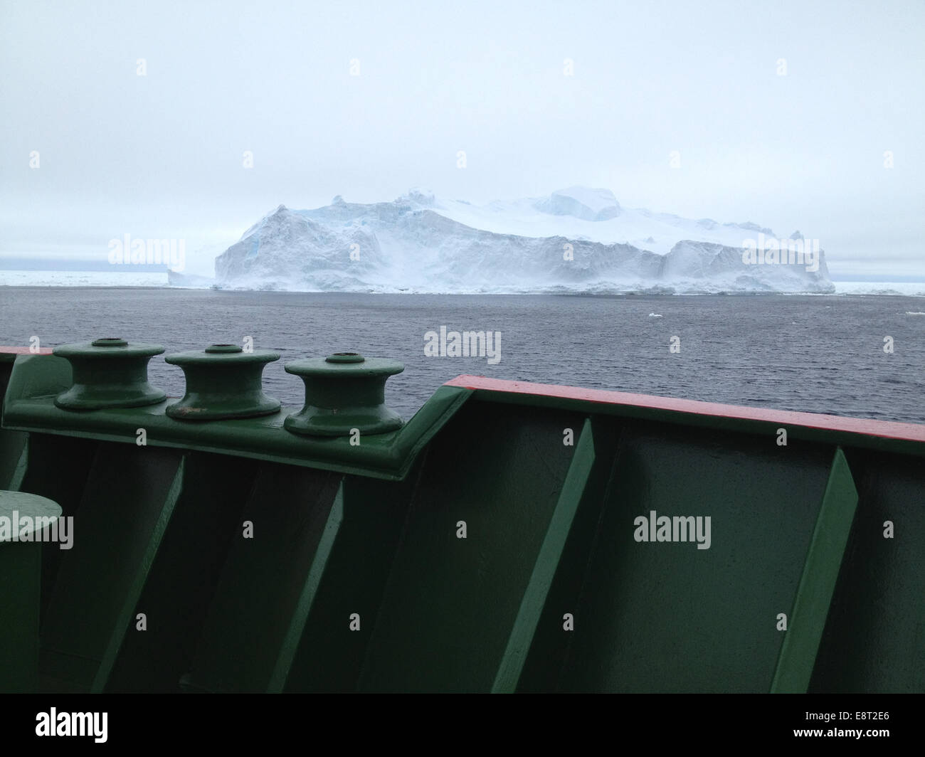 An iceberg as viewed from the bow of the RRS Ernest Shackleton a few days before the BARREL team reached Halley Research Station in Antarctica. This research vessel regularly carries scientists and supplies to Halley. Stock Photo