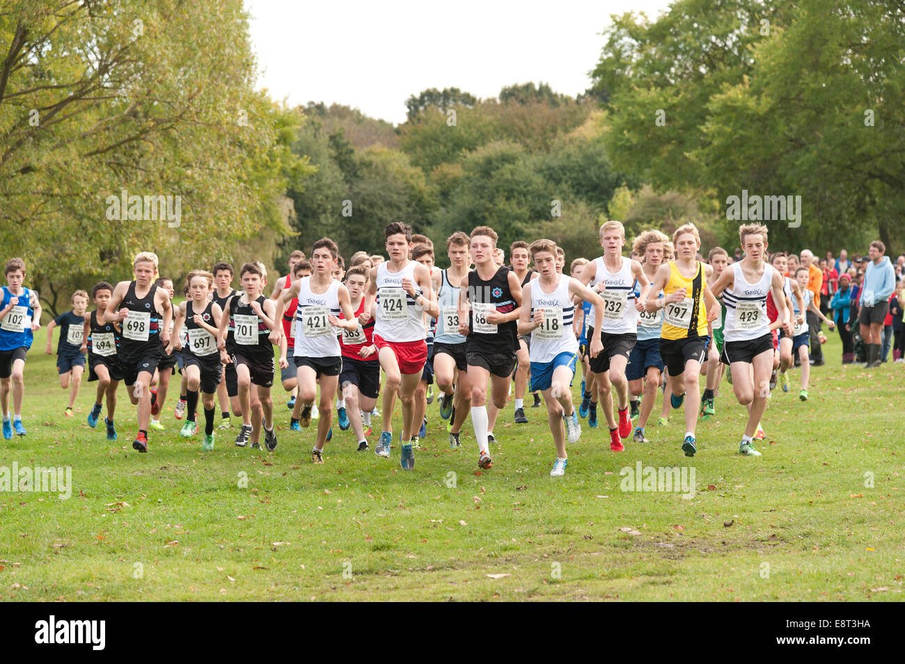 Cross country Kent Athletics team championships events start of race pack sprinting runners joggling for early lead Stock Photo