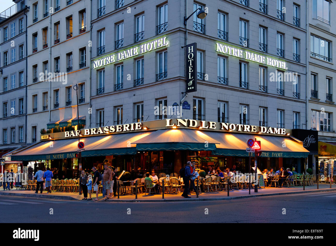 Notre-Dame Hotel, bar, brasserie, at dusk, Paris, Île-de-France, France ...