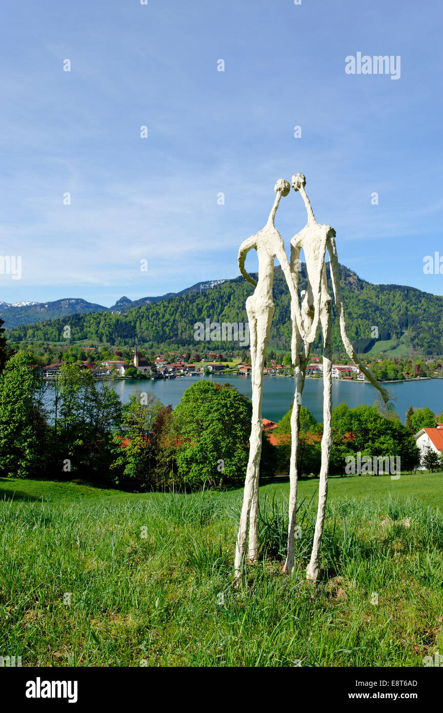 Sculpture garden by Heinz Viehweger, at back Rottach-Egern on Tegernsee Lake, Upper Bavaria, Bavaria, Germany Stock Photo