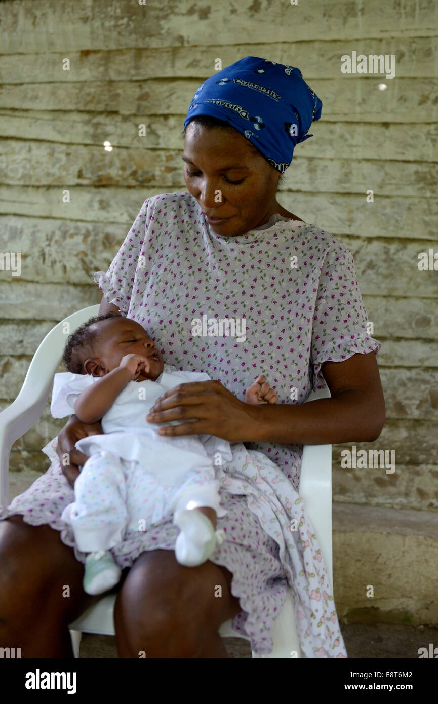 Woman, 38 years, with baby, 3 months, Village Morin in Leogane, Haiti Stock Photo
