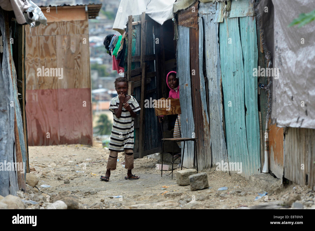 Children in front of a shack, Fort National slum, Port-au-Prince, Haiti Stock Photo