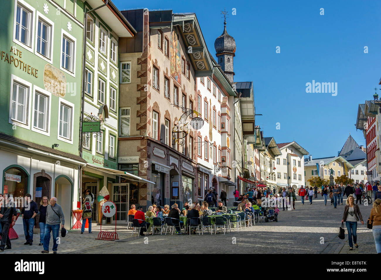 Row of houses and street cafes at the Marktstraße street, Bad Tölz, Upper Bavaria, Bavaria, Germany Stock Photo