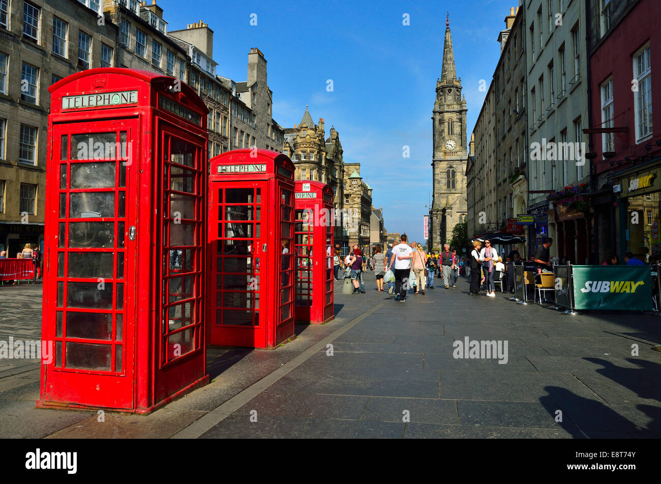 Typical red telephone boxes in the High Street, Edinburgh, Scotland, United Kingdom Stock Photo