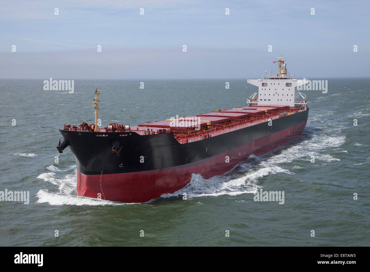 Container ship sailing on calm sea Stock Photo