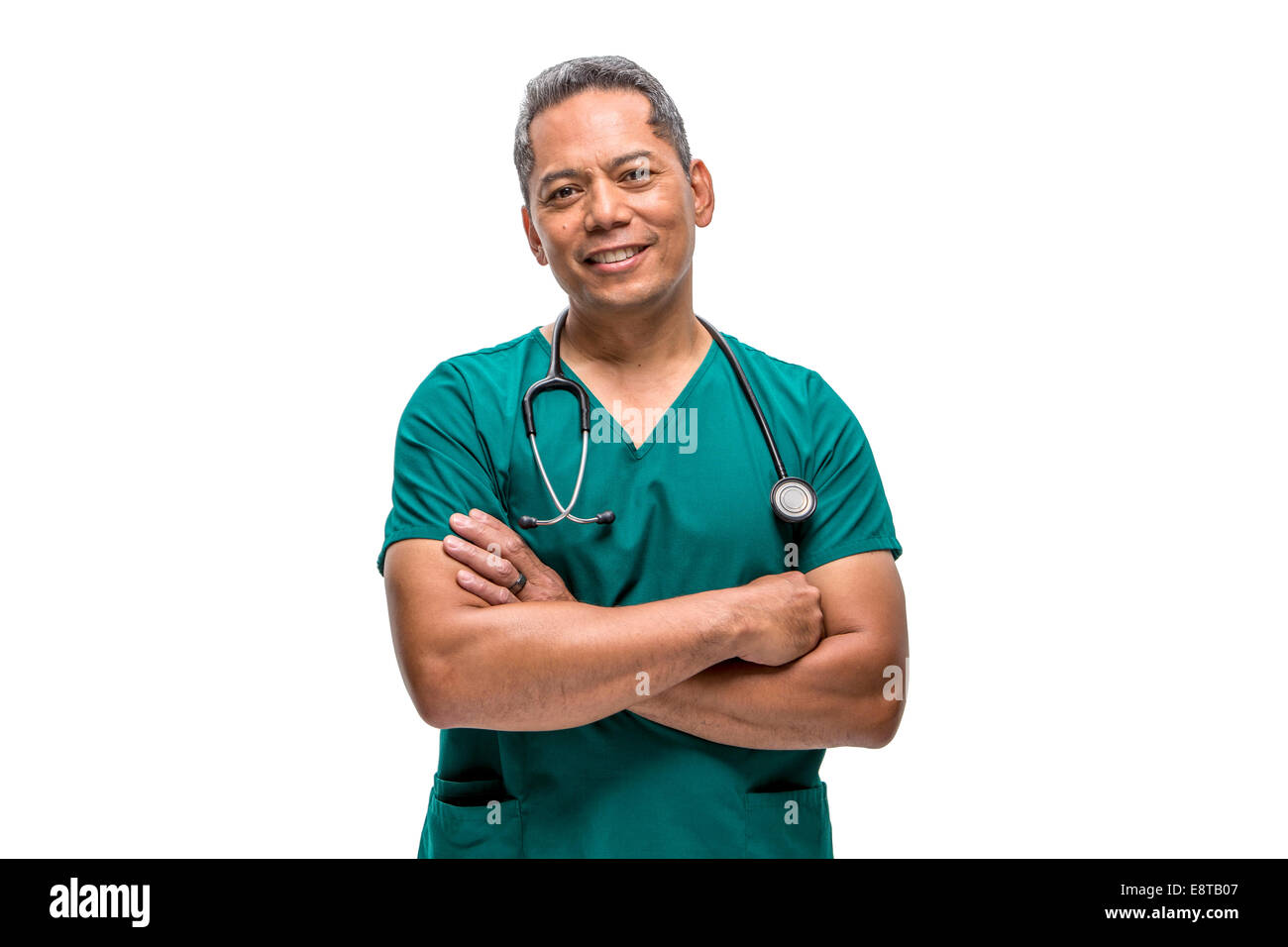 Pacific Islander nurse standing with arms crossed Stock Photo