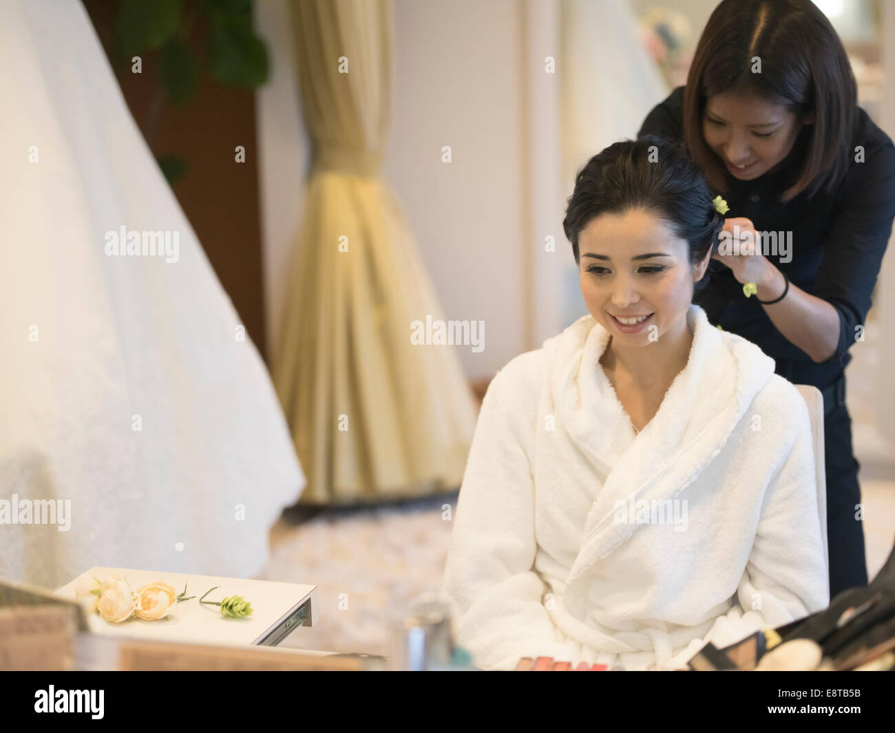 Mixed Race Asian American Bride Has Makeup And Hair Styled By