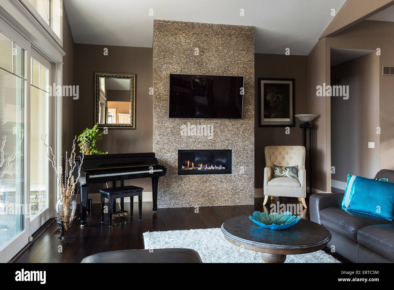 Television Sofa Piano And Fireplace In Modern Living Room Stock Photo Alamy