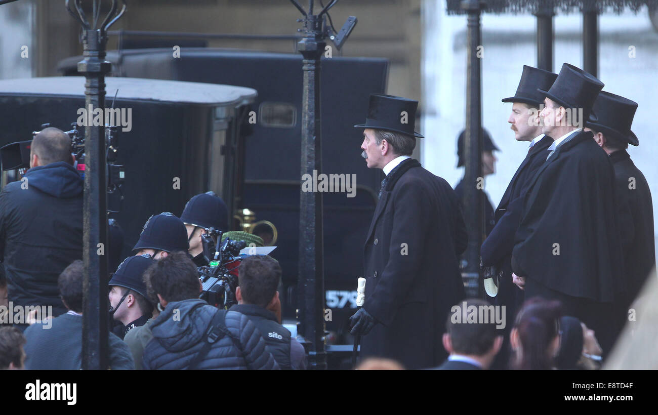 Helena Bonham Carter and Carey Mulligan film a scene for the movie 'Suffragette' outside the Palace of Westminster. This is the first time a movie has been granted permission to film inside the Houses of Parliament.  Featuring: Atmosphere Where: London, United Kingdom When: 11 Apr 2014 Stock Photo