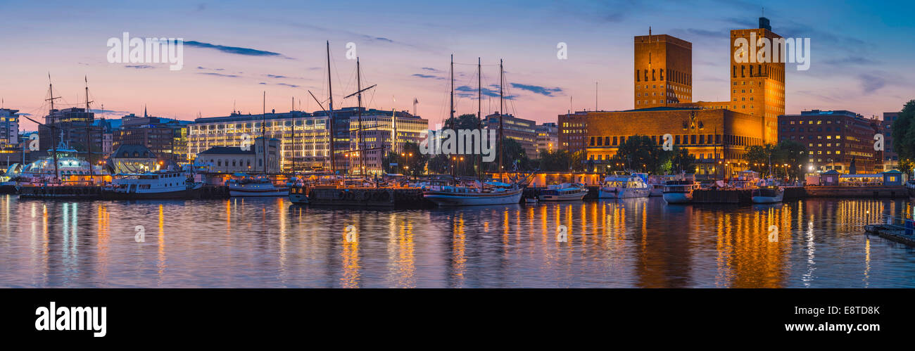 Panoramic view of Oslo harbor and city skyline at sunset, Ostlandet, Norway Stock Photo