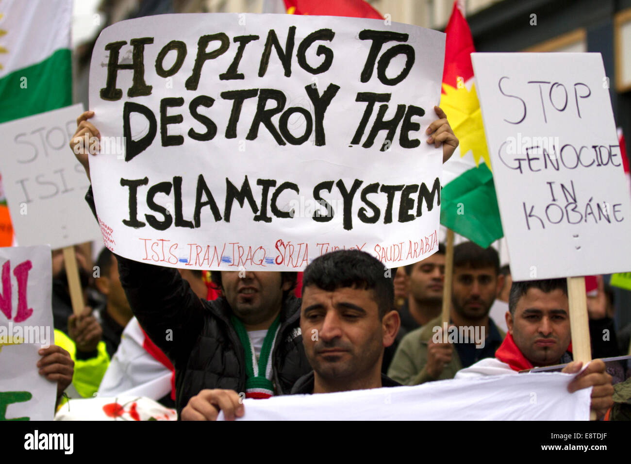 'Save Kobane' & Protect humanity protesters; A protest march  through Liverpool city centre to demonstrate against terrorist group ISIS. Around 300 Kurdish people marched along Church Street, Bold Street and Renshaw Street before picketing outside Lime St Station. Sabiha Soylu took part in the march because she feels more needs to be done to help Kurdish fighters - who are battling with heavily-armed ISIS mililtants. Stock Photo