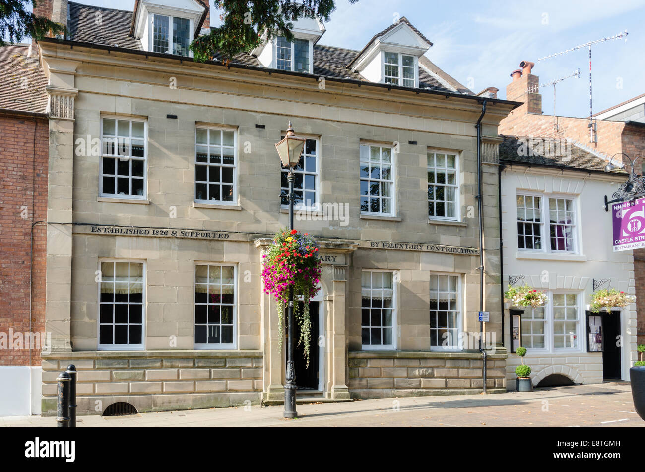 Old building in Castle Street, Warwick which was formerly a dispensary supported by voluntary contributions Stock Photo
