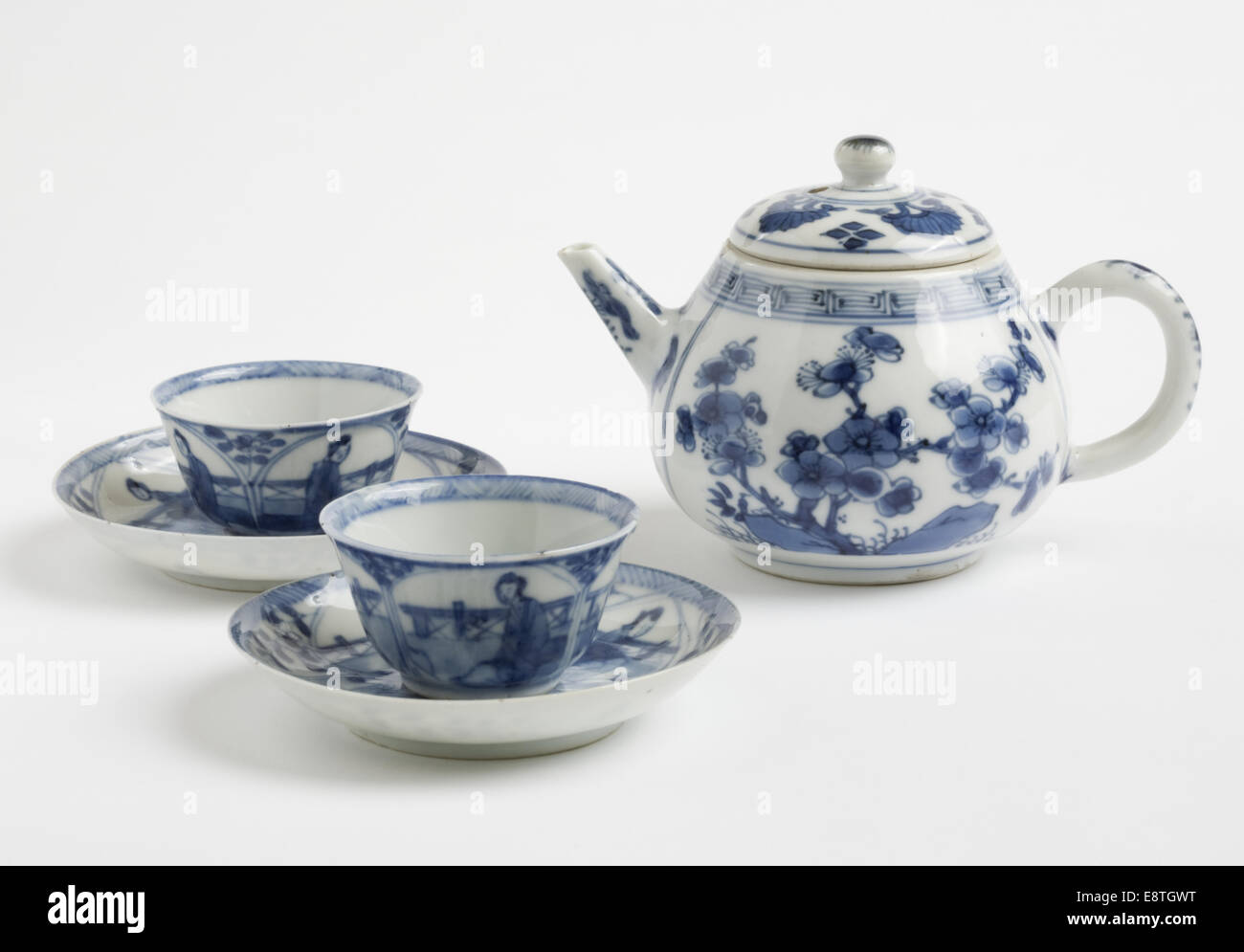 Teapot with two cups and saucers Stock Photo Alamy