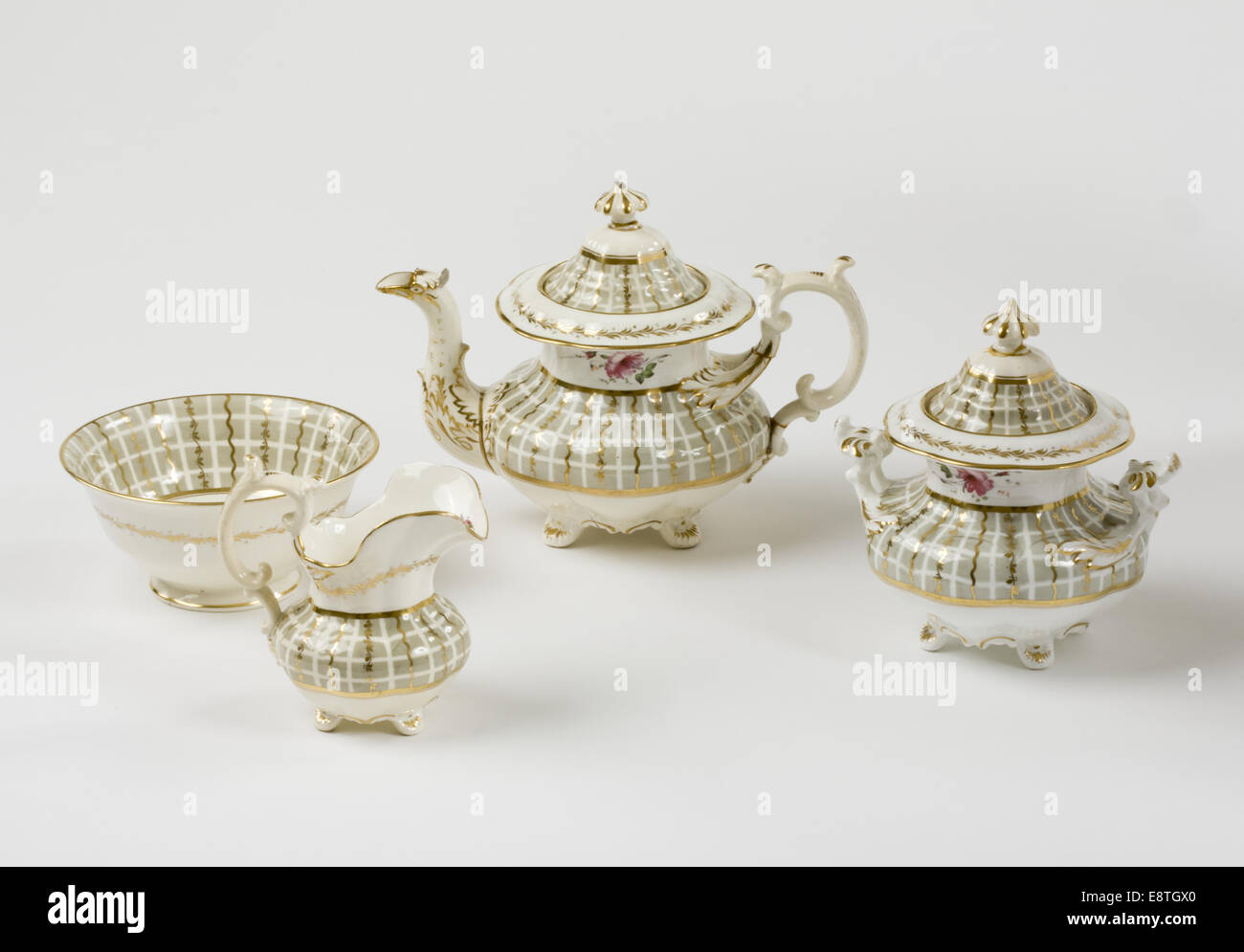 Slop bowl, milk jug, teapot and sugar pot Stock Photo Alamy