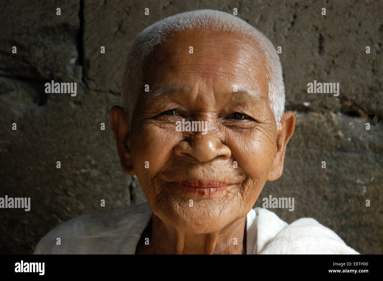A Local Beautiful Old Lady With Short Hair From Cambodia With A