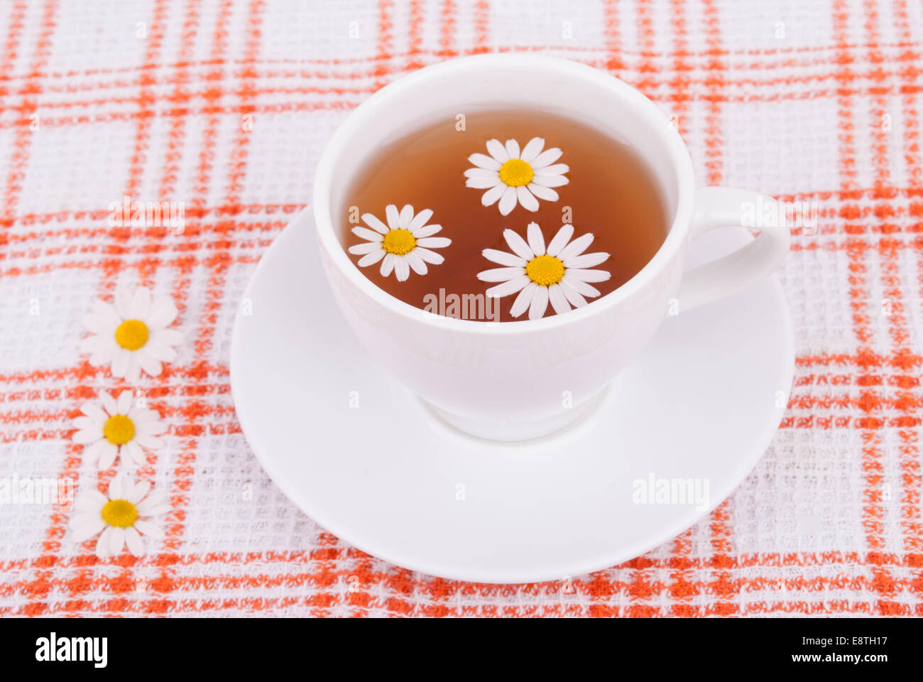 Cup of tea with chamomile. Stock Photo