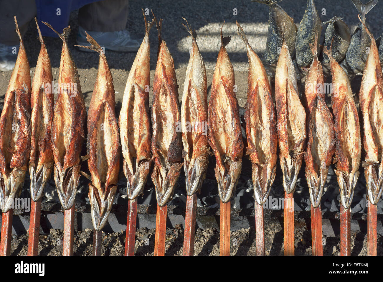 Open Fire Grilled Fish on a Stick Stock Photo Alamy