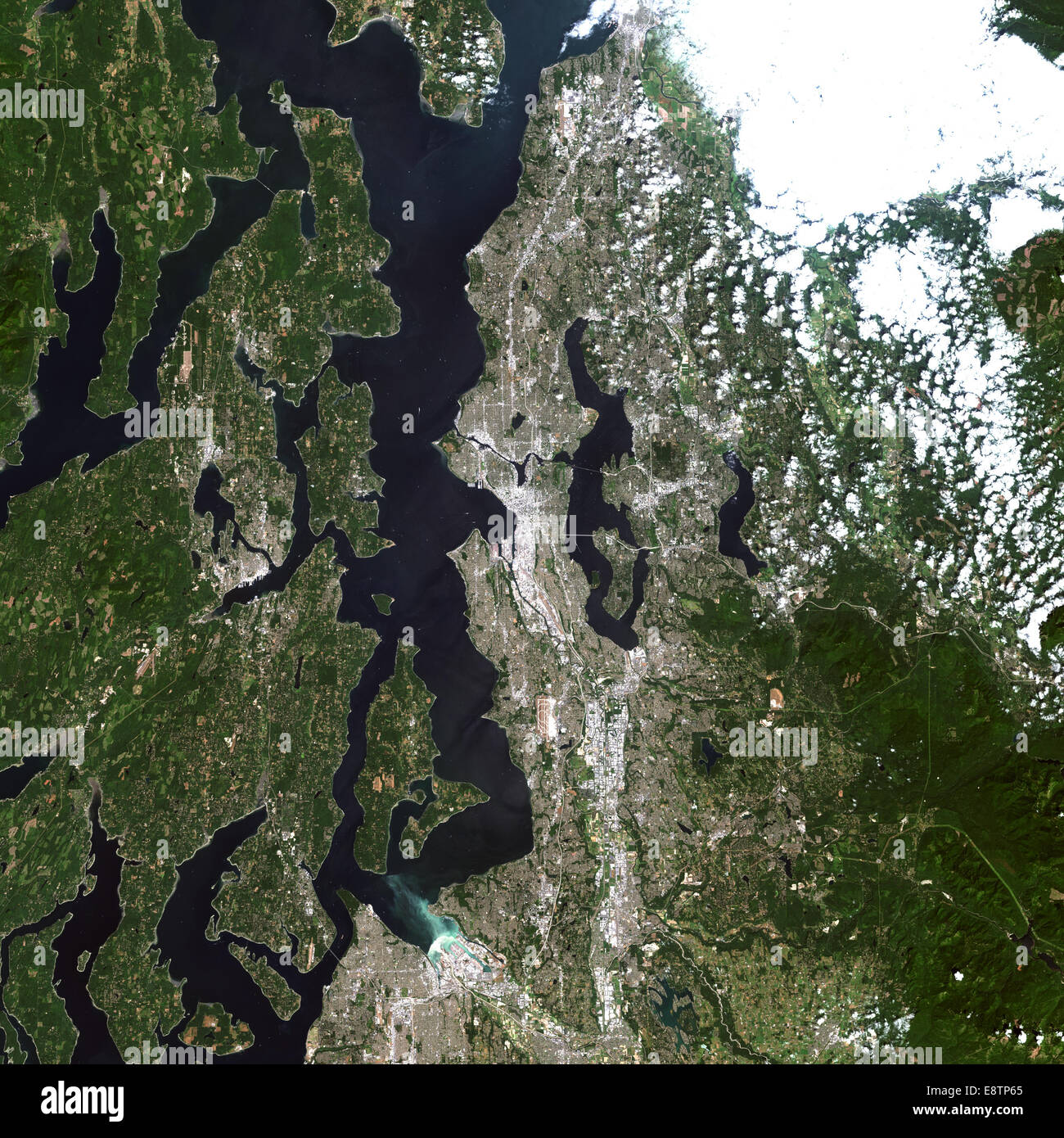 Landsat 7 image of Seattle, Washington acquired August 4, 2013. Landsat 7 is a U.S. satellite used to acquire remotely sensed images of the Earth's land surface and surrounding coastal regions. It is maintained by the Landsat 7 Project Science Office at t Stock Photo