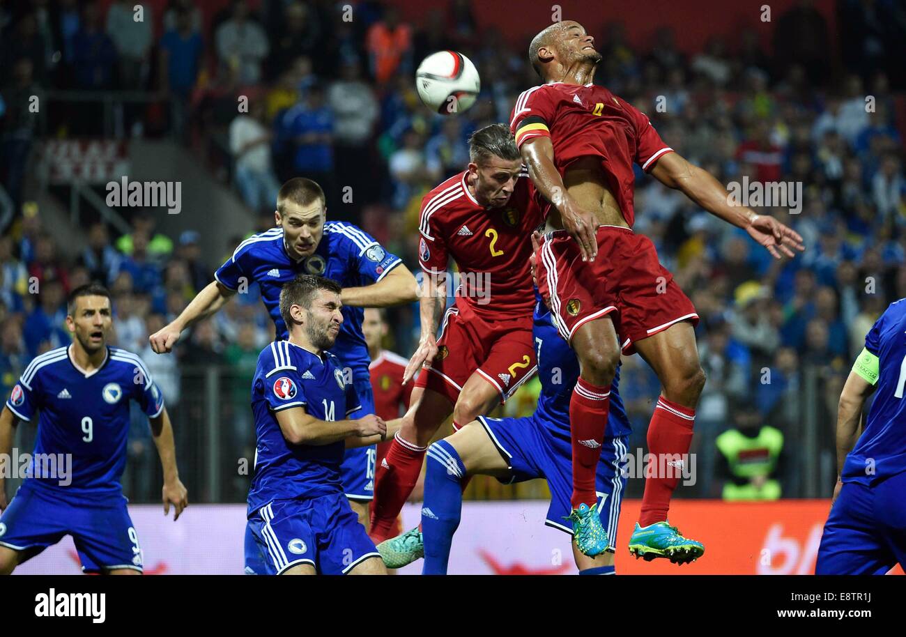 13.10.2014. Zenica, Bosnia and Herzegovina. Euro 2016 qualification match. Bosnia Herzegovine versus Belgium.  Tino-Sven Susic  (BOS) loses out to the header from Toby Alderweireld and Vincent Kompany (BEL) Stock Photo