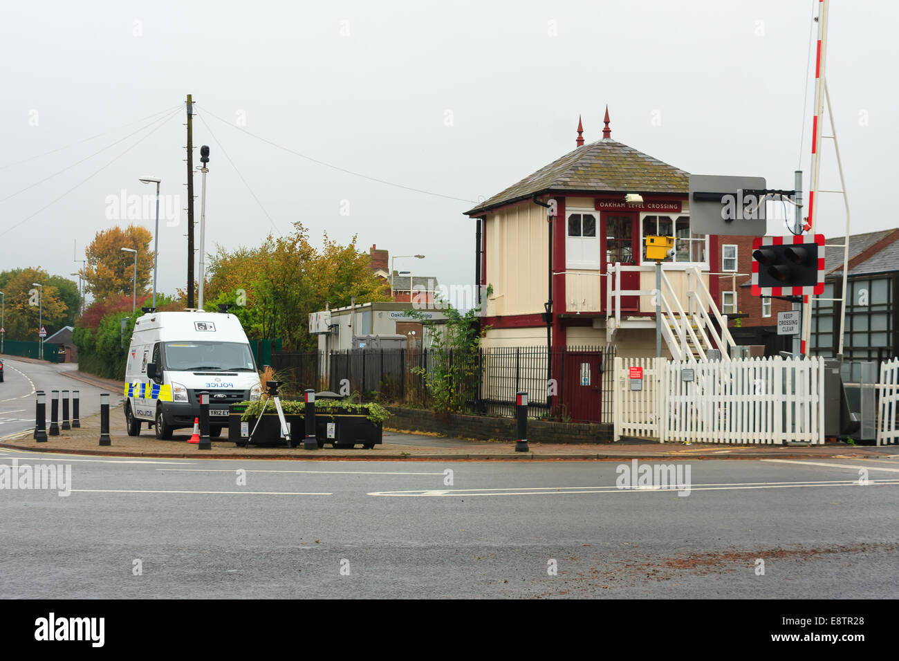 Oakham, Rutland, UK. 14th October, 2014. British Transport Police camera van monitors Oakham town rail crossing Rutland, England, UK.. The crossing has the 3rd highest number of driving offences in the country where drivers risk lives by driving through the crossing barriers when the stop lights are flashing. Credit:  Jim Harrison/Alamy Live News Stock Photo