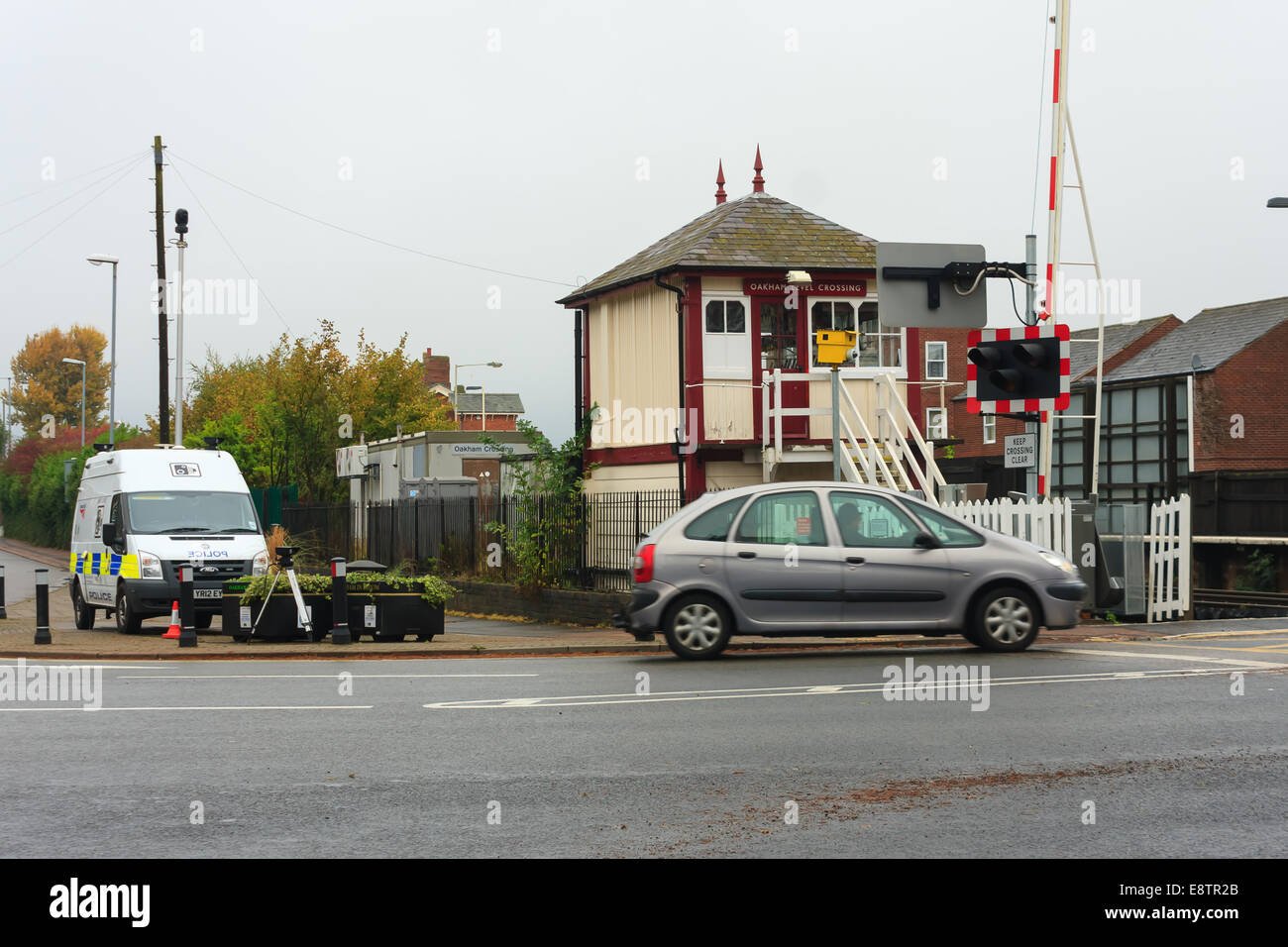 Oakham, Rutland, UK. 14th October, 2014. British Transport Police camera van monitors Oakham town rail crossing Rutland, England, UK.. The crossing has the 3rd highest number of driving offences in the country where drivers risk lives by driving through the crossing barriers when the stop lights are flashing. Credit:  Jim Harrison/Alamy Live News Stock Photo