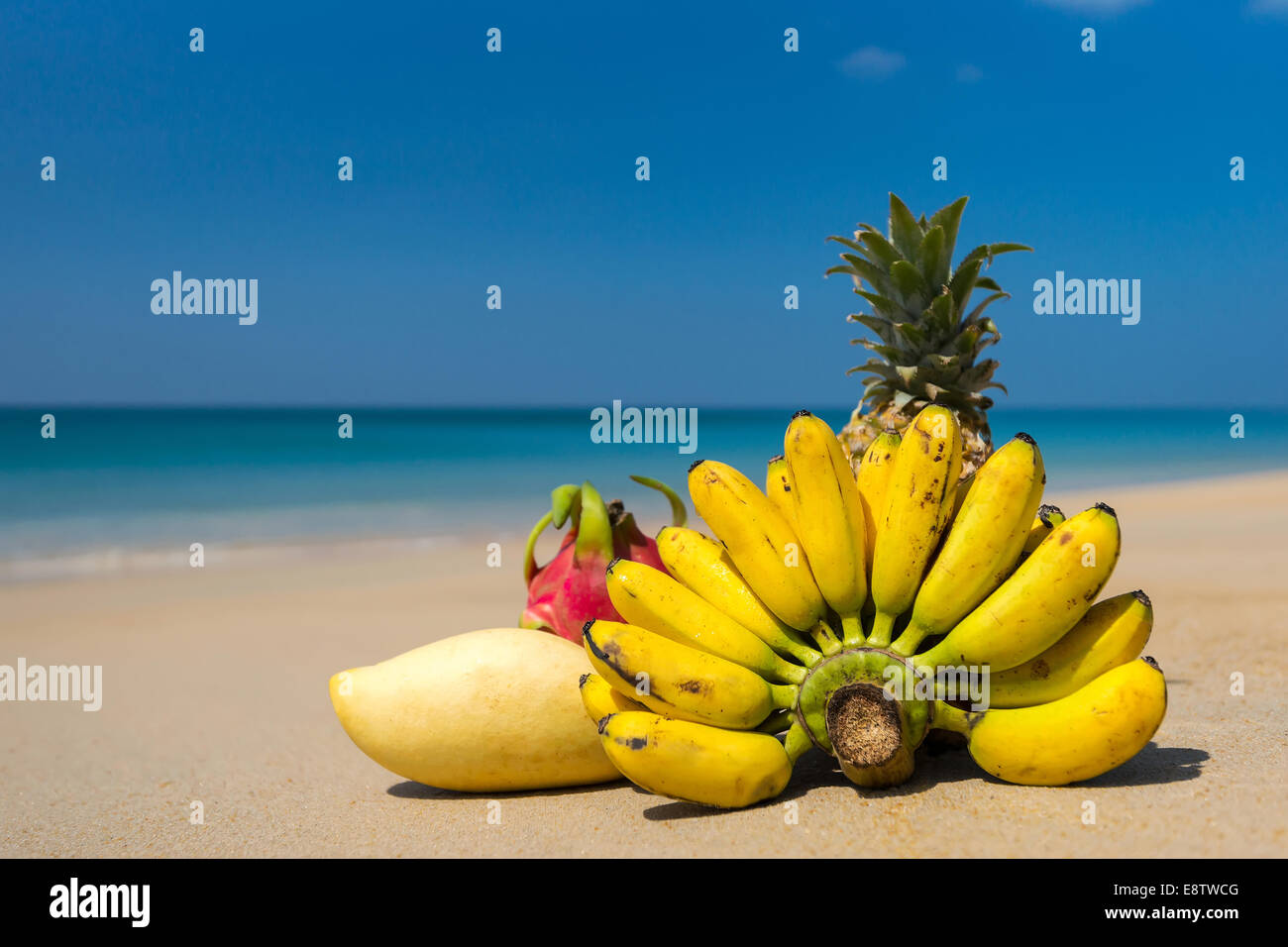 Tropical exotic fruits on the beach. Idealistic scene leisure travel