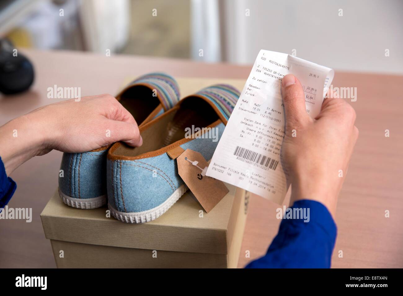 Customer returning clothes hires stock photography and images Alamy