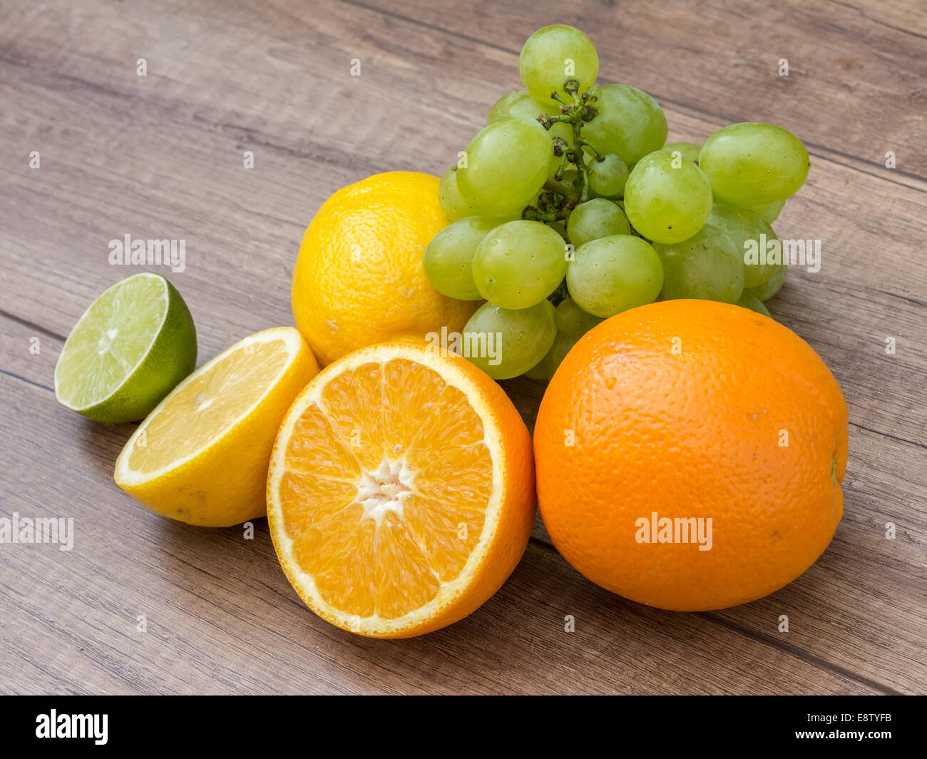 Oranges, Lemons And Lime Fruit On Table Stock Photo - Alamy