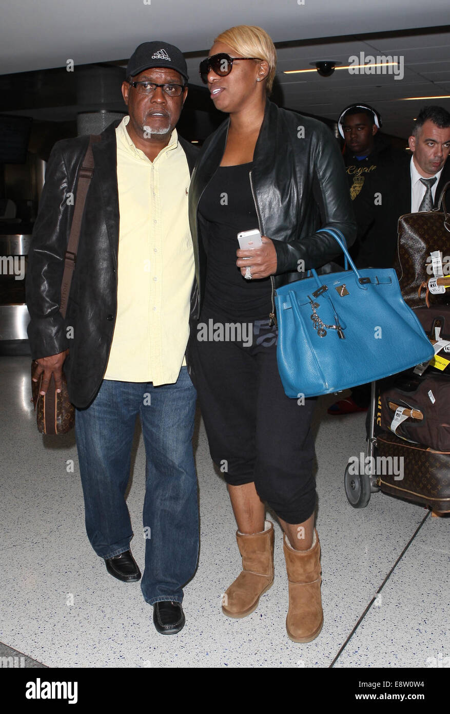 NeNe Leakes arrives at Los Angeles International Airport (LAX) carrying her  blue Hermes Birkin bag Featuring: NeNe Leakes,Gregg Leakes Where: Los  Angeles, California, United States When: 11 Apr 2014 Stock Photo - Alamy