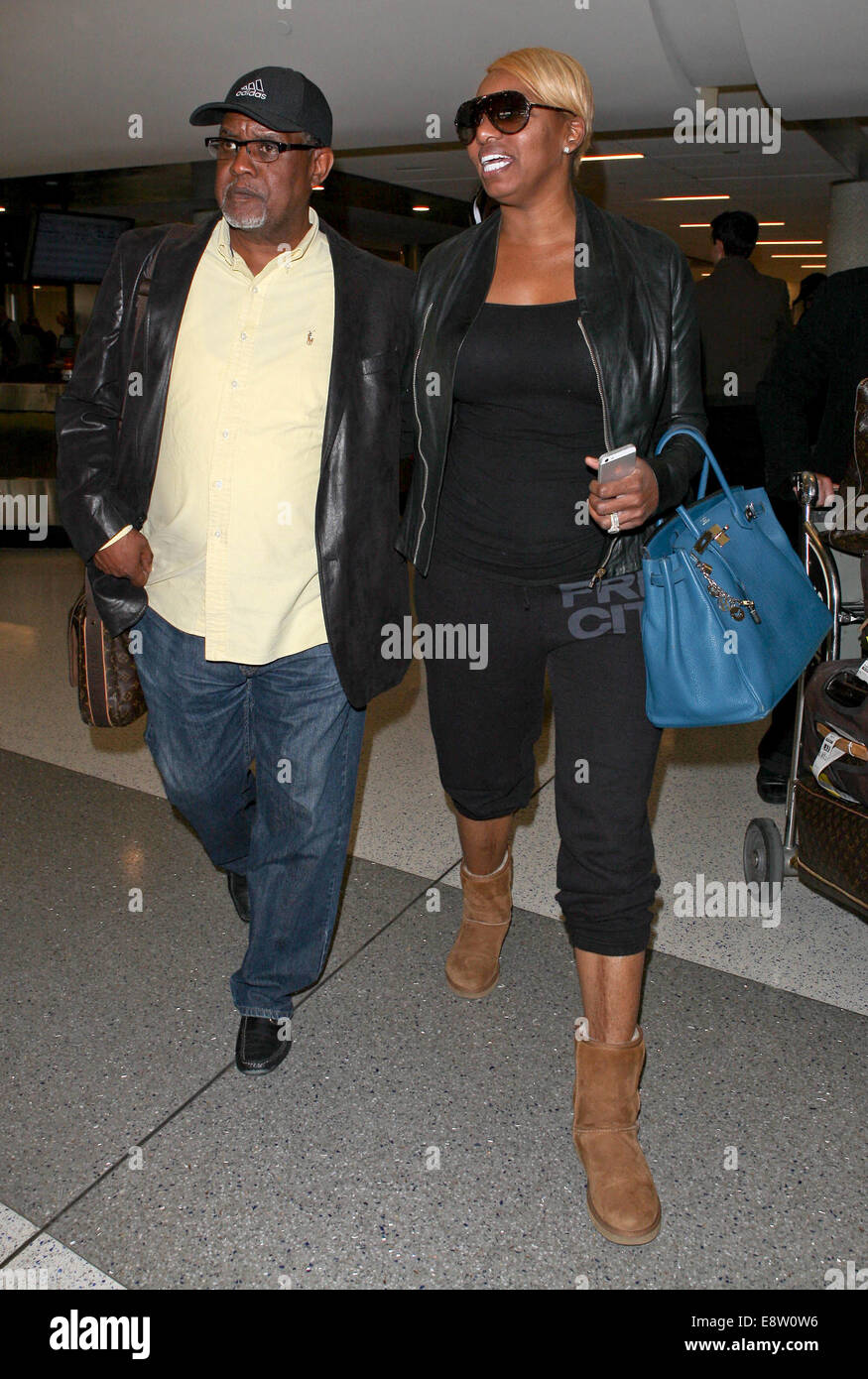 NeNe Leakes arrives at Los Angeles International Airport (LAX) carrying her  blue Hermes Birkin bag Featuring: NeNe Leakes,Gregg Leakes Where: Los  Angeles, California, United States When: 11 Apr 2014 Stock Photo - Alamy