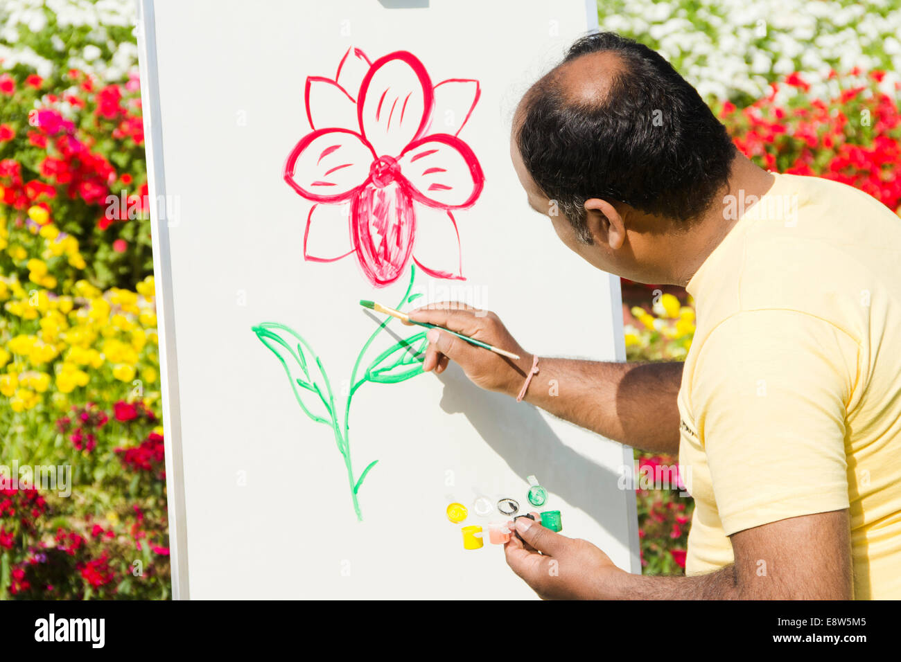 Indian man painting hi-res stock photography and images - Alamy