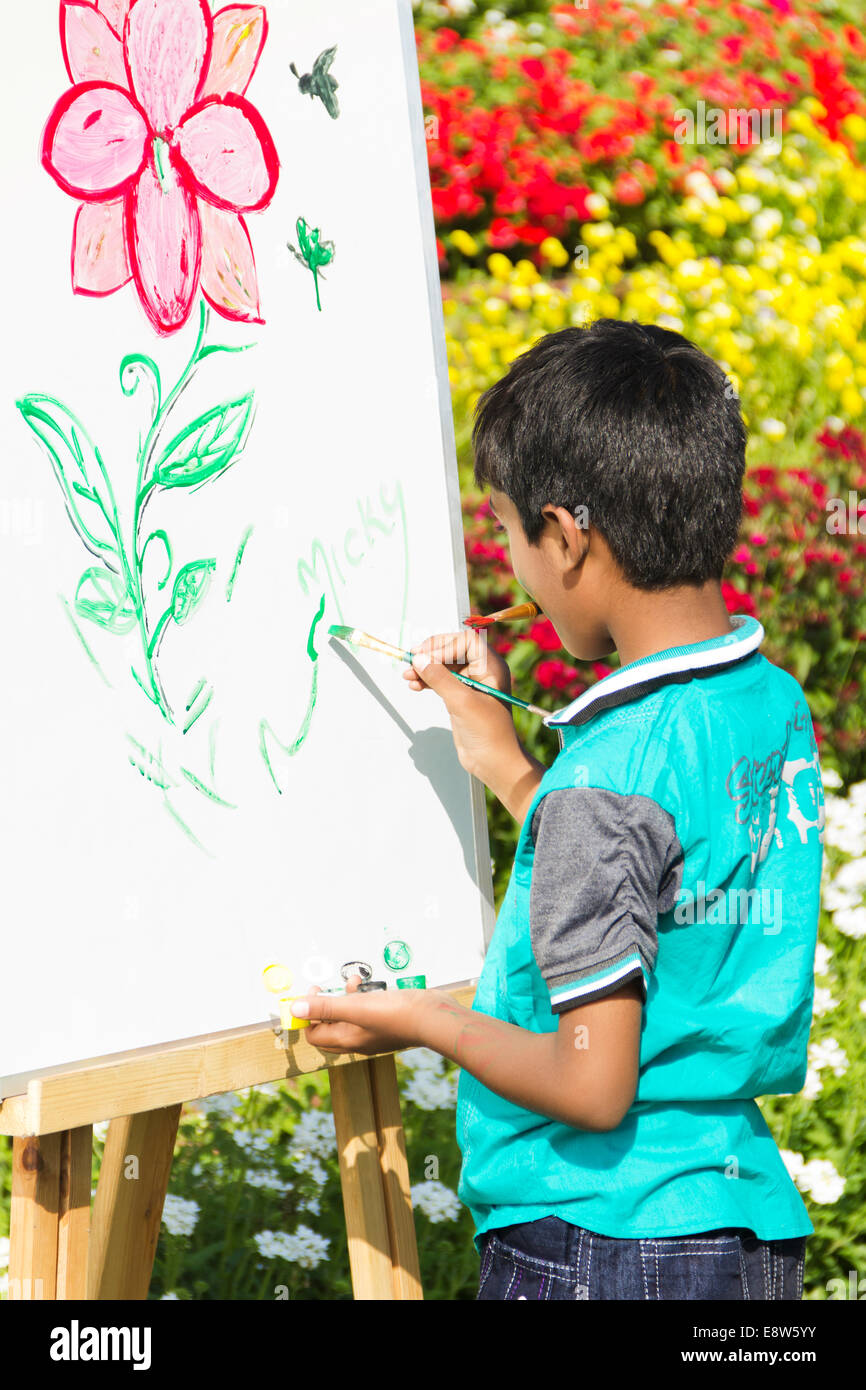 1 Indian kid Painting at Canvas Stock Photo