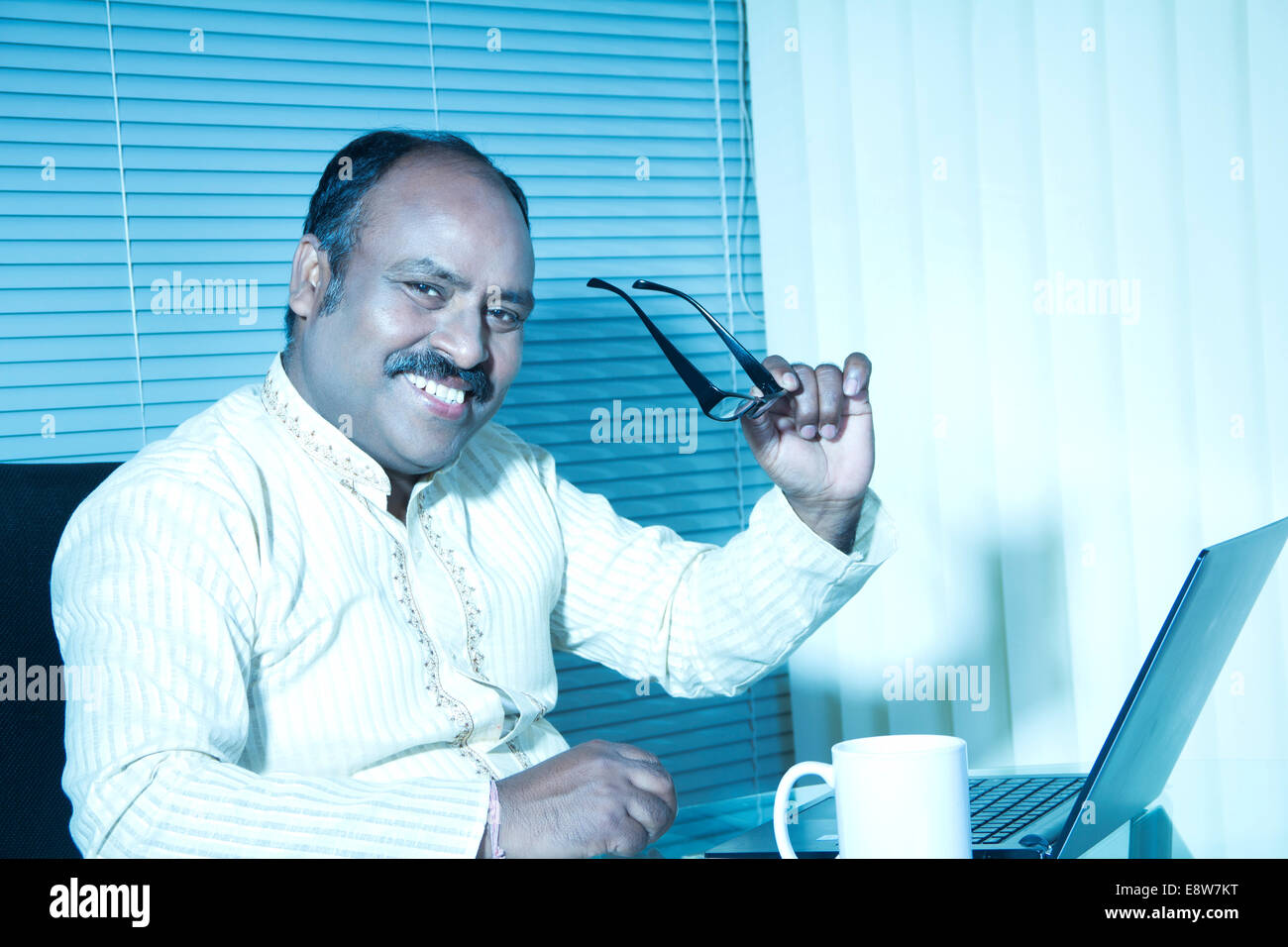 1 Indian man Working in Office Stock Photo