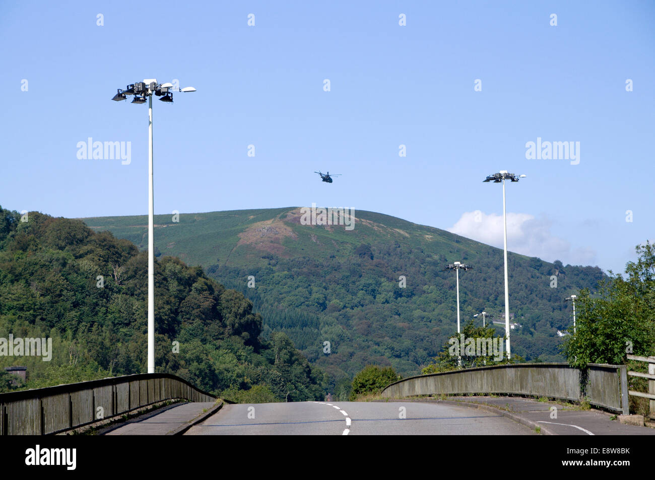 Helicopter above road with The Garth Mountain in the distance, Taffs Well, South Wales, UK. Stock Photo