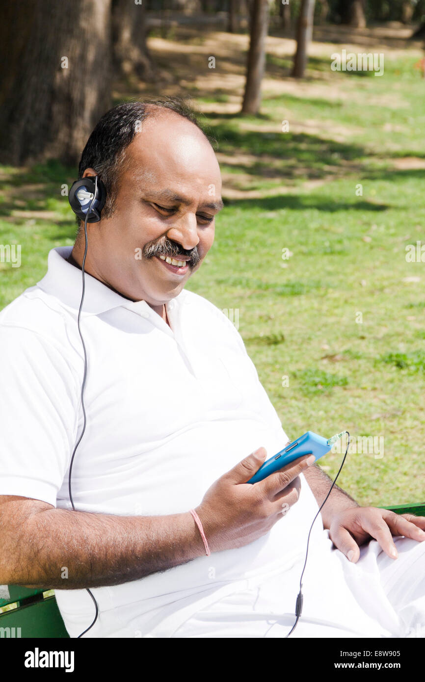 Indian man headphone hearing music hi-res stock photography and images ...