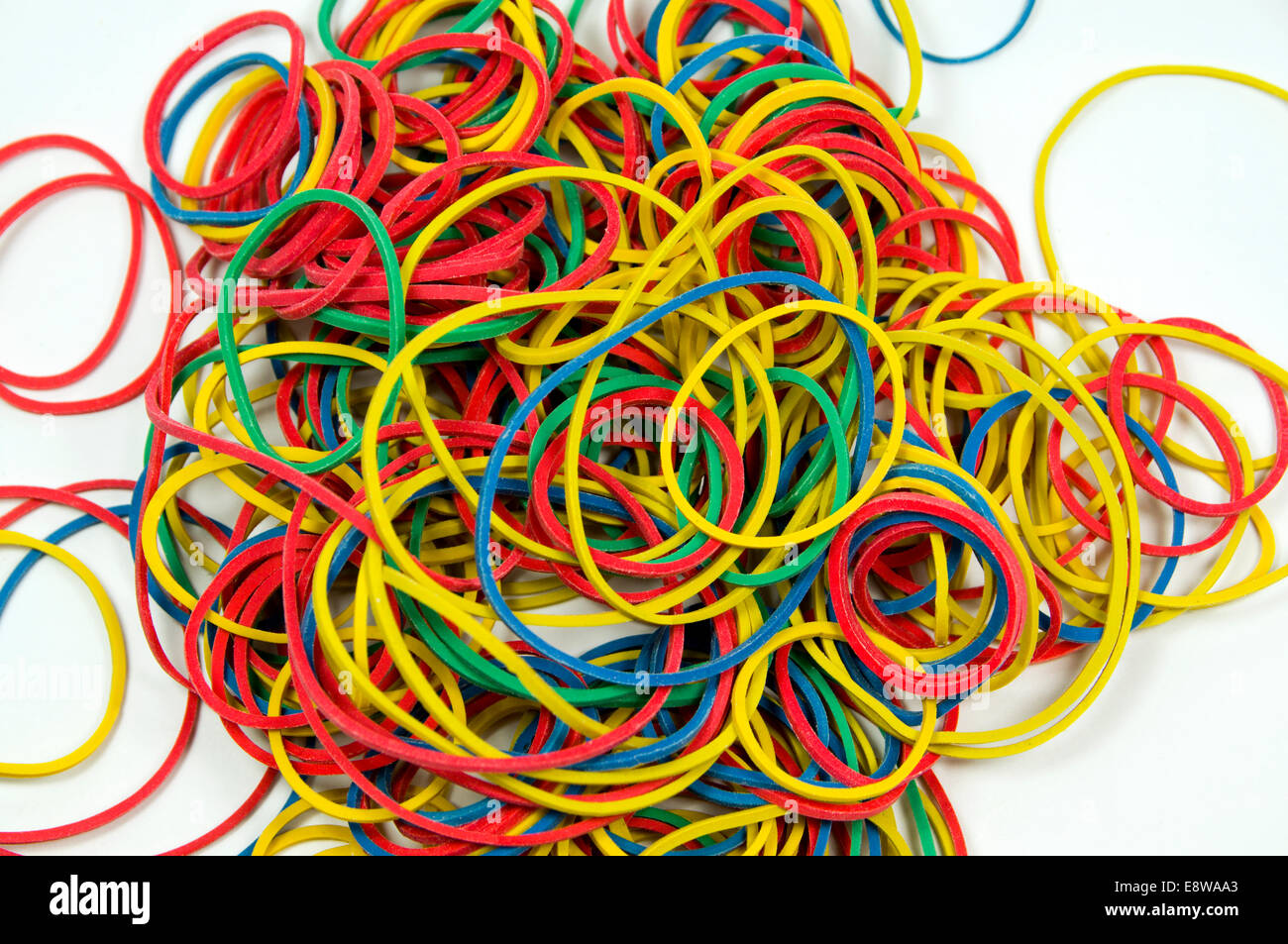 Pile of multi coloured rubber bands Stock Photo