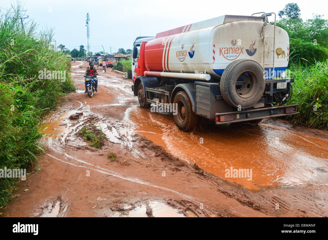 A truck crossing a flooded road during the rainy season in Nigeria Stock Photo