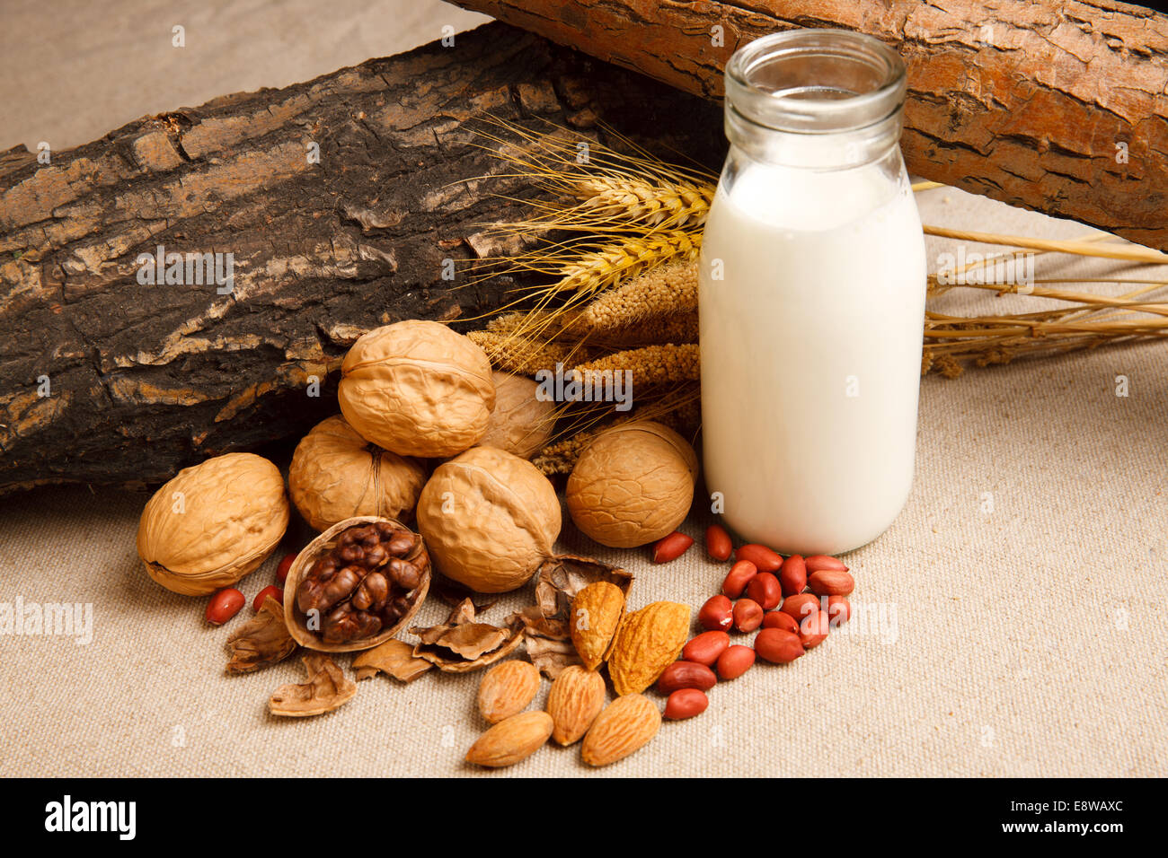 Nuts and milk Stock Photo Alamy