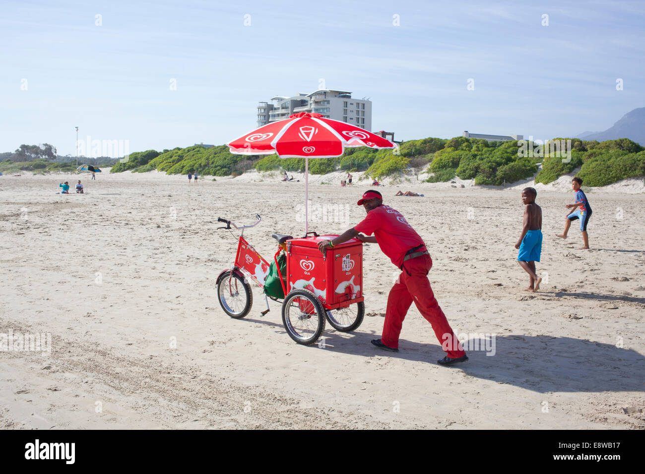 Ice cream salesman on the beach, Strand, Western Cape Stock Photo