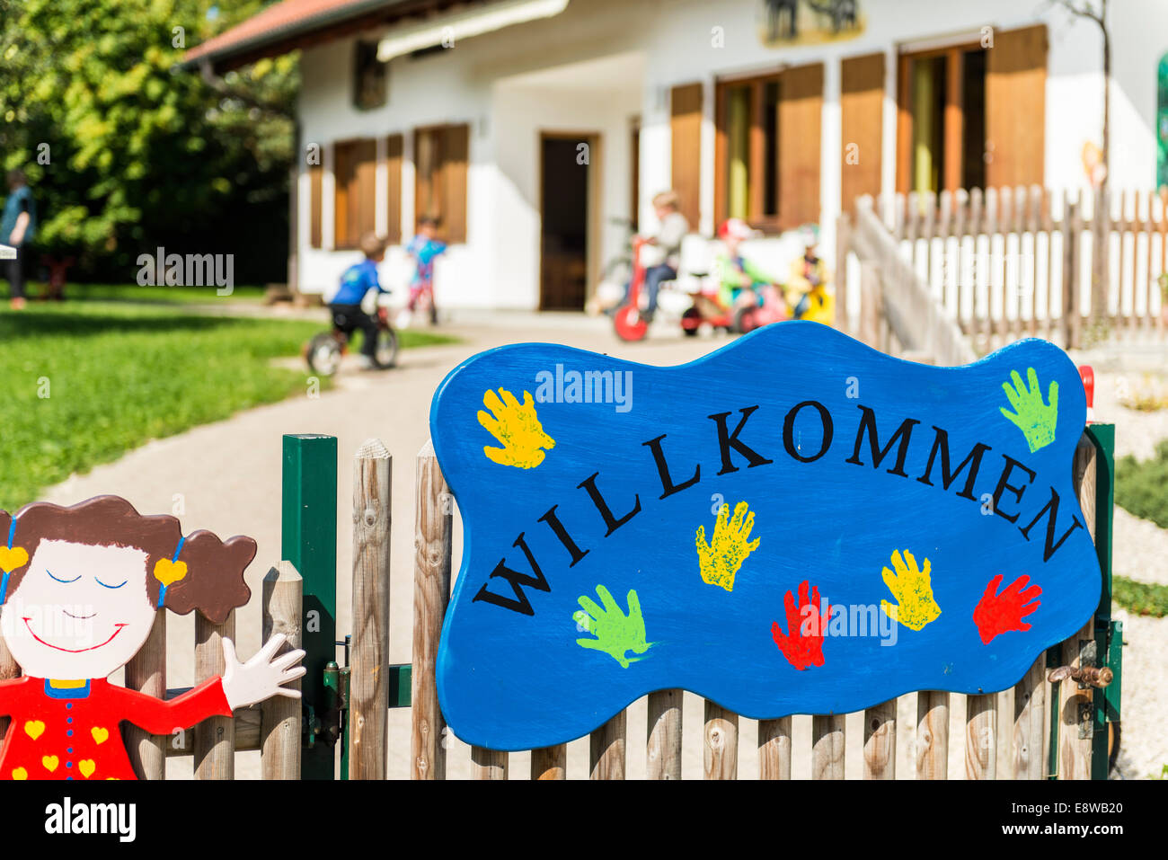 "Willkommen" Sign in front of Kindergarten in Bavaria, Germany Stock "Willkommen" Sign in front of Kindergarten in Bavaria, Germany Stock