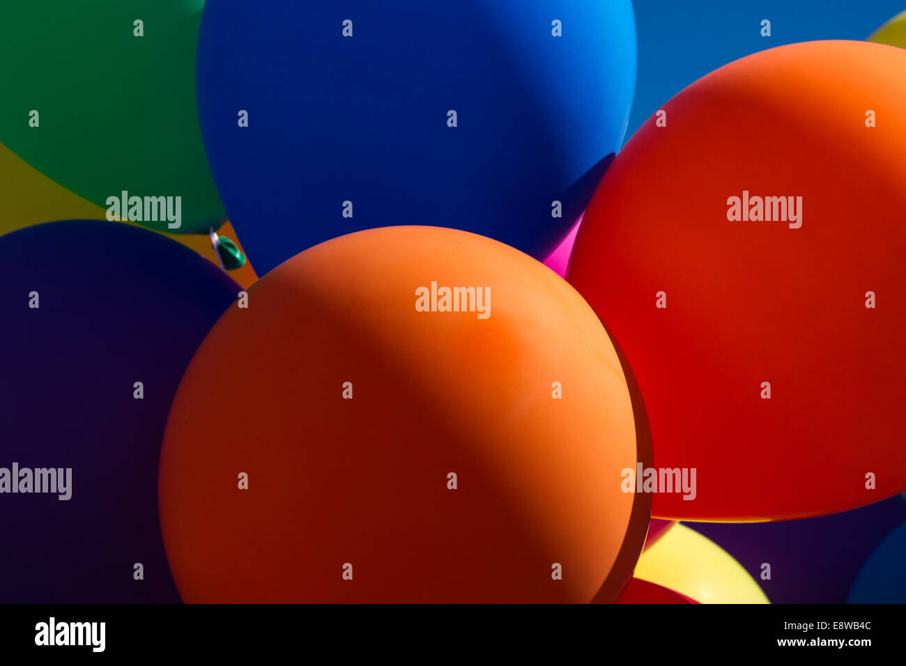 Festive Mood. Closeup view of inflatable balloons of bright and intense colors Stock Photo