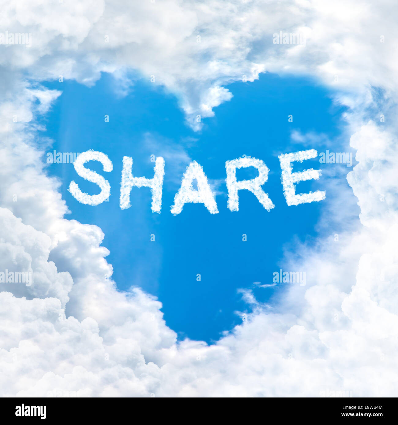 share word on blue sky inside heart cloud form Stock Photo