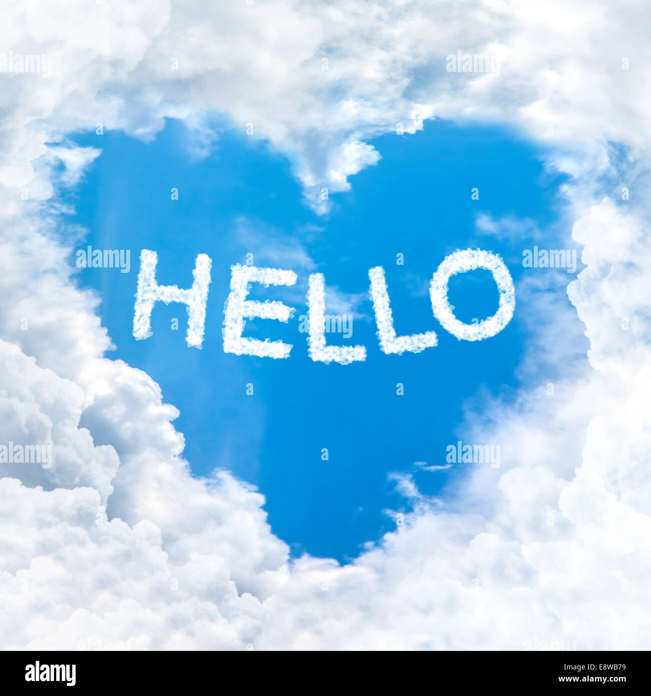 hello word on blue sky inside heart cloud form Stock Photo