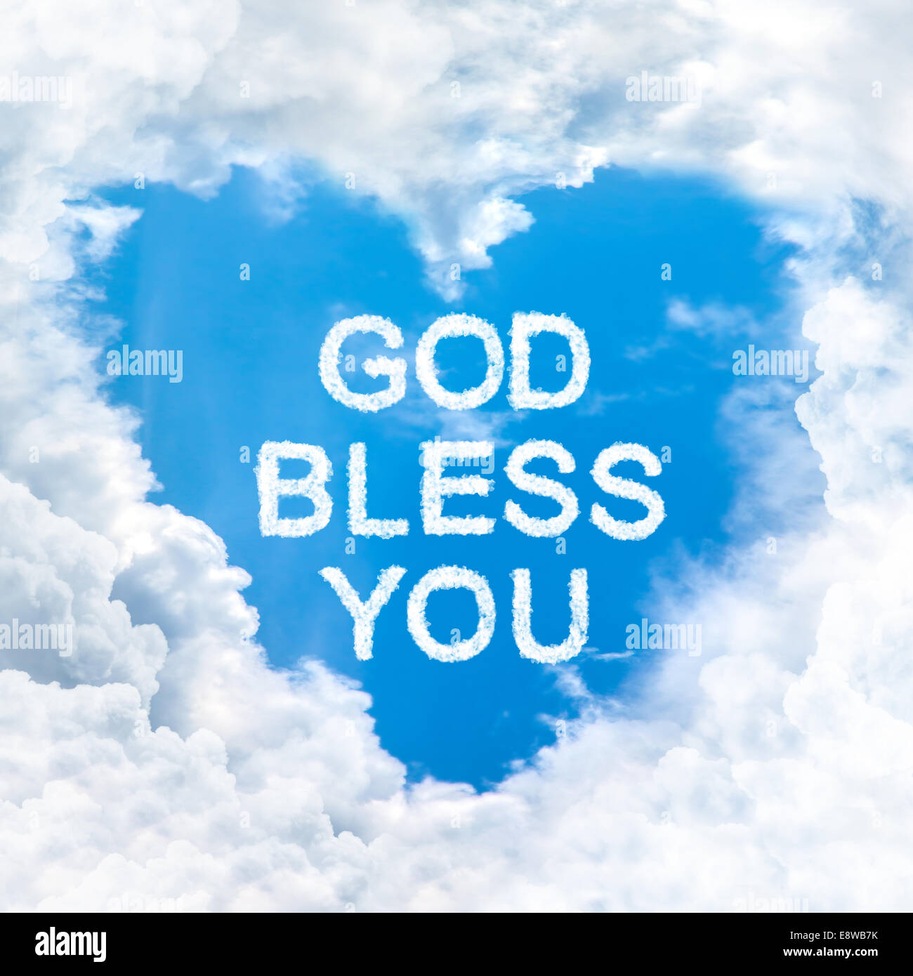 god bless you word on blue sky inside heart cloud form Stock Photo - Alamy