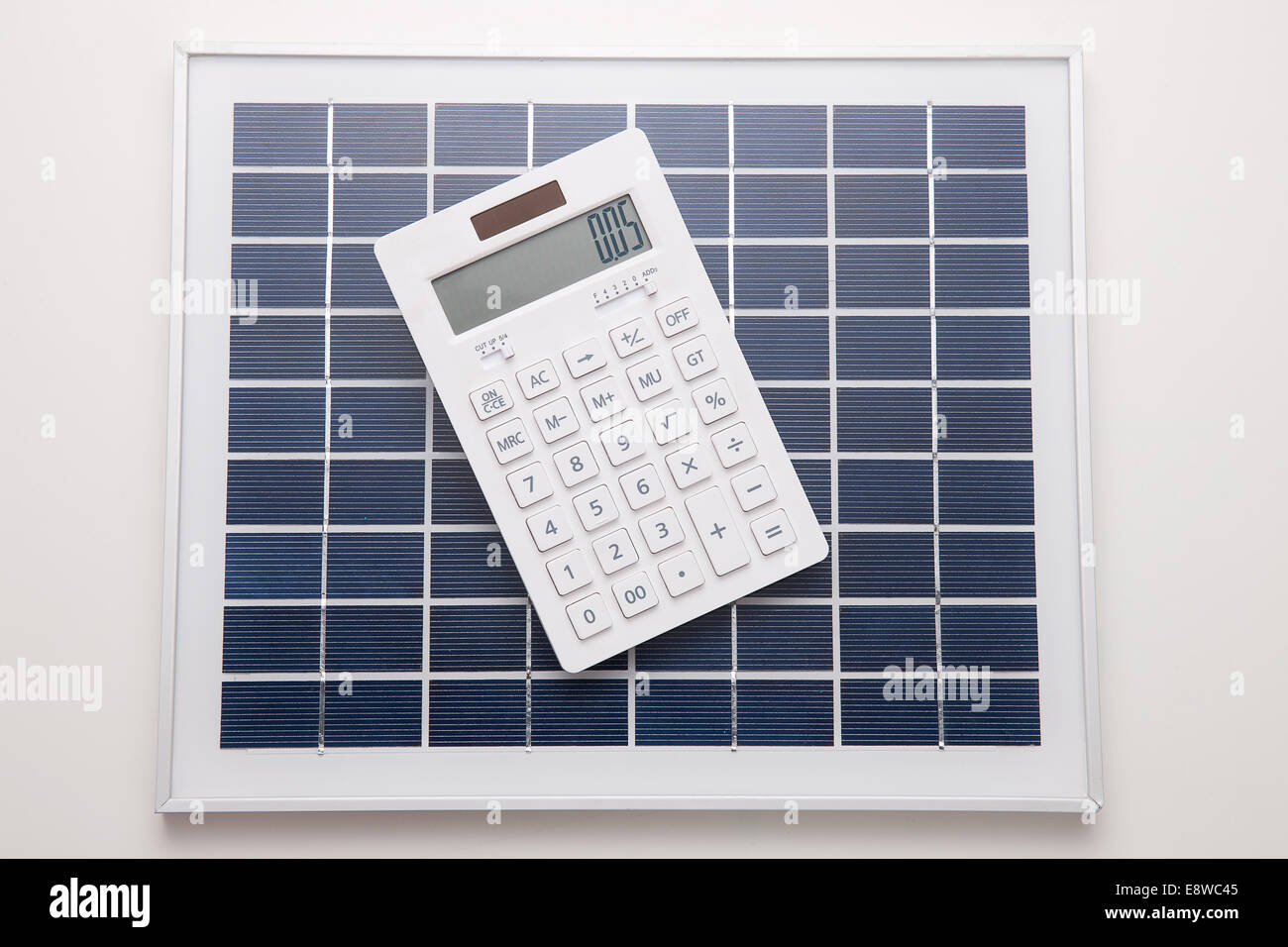 Calculator solar panels Stock Photo Alamy