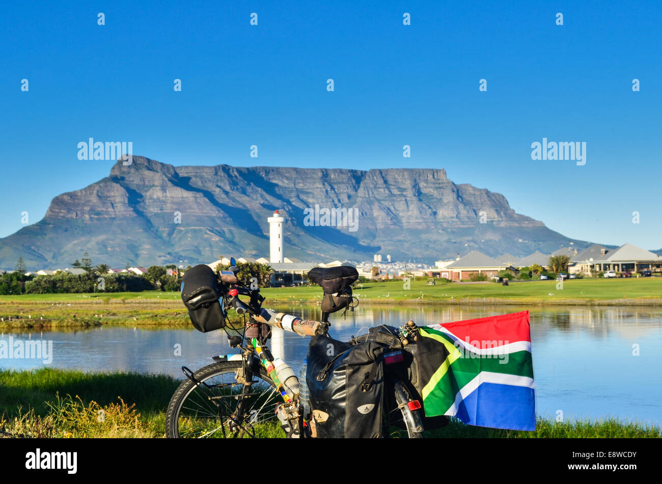 A bicycle and South African flag in front of Table Mountain, Cape Town, South Africa Stock Photo