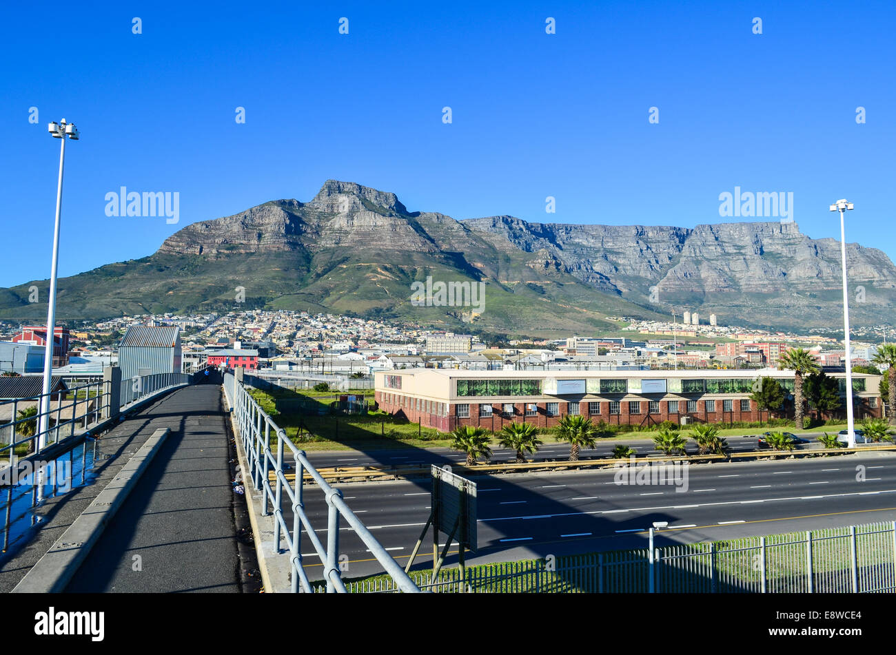Bridge over highway and train tracks near the Woodstock railway station in Cape Town, South Africa Stock Photo