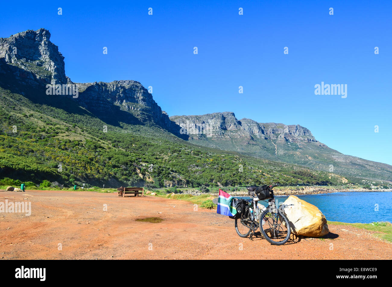 Bicycle touring and the dramatic landscape in Hout Bay, Cape Town peninsula, South Africa Stock Photo